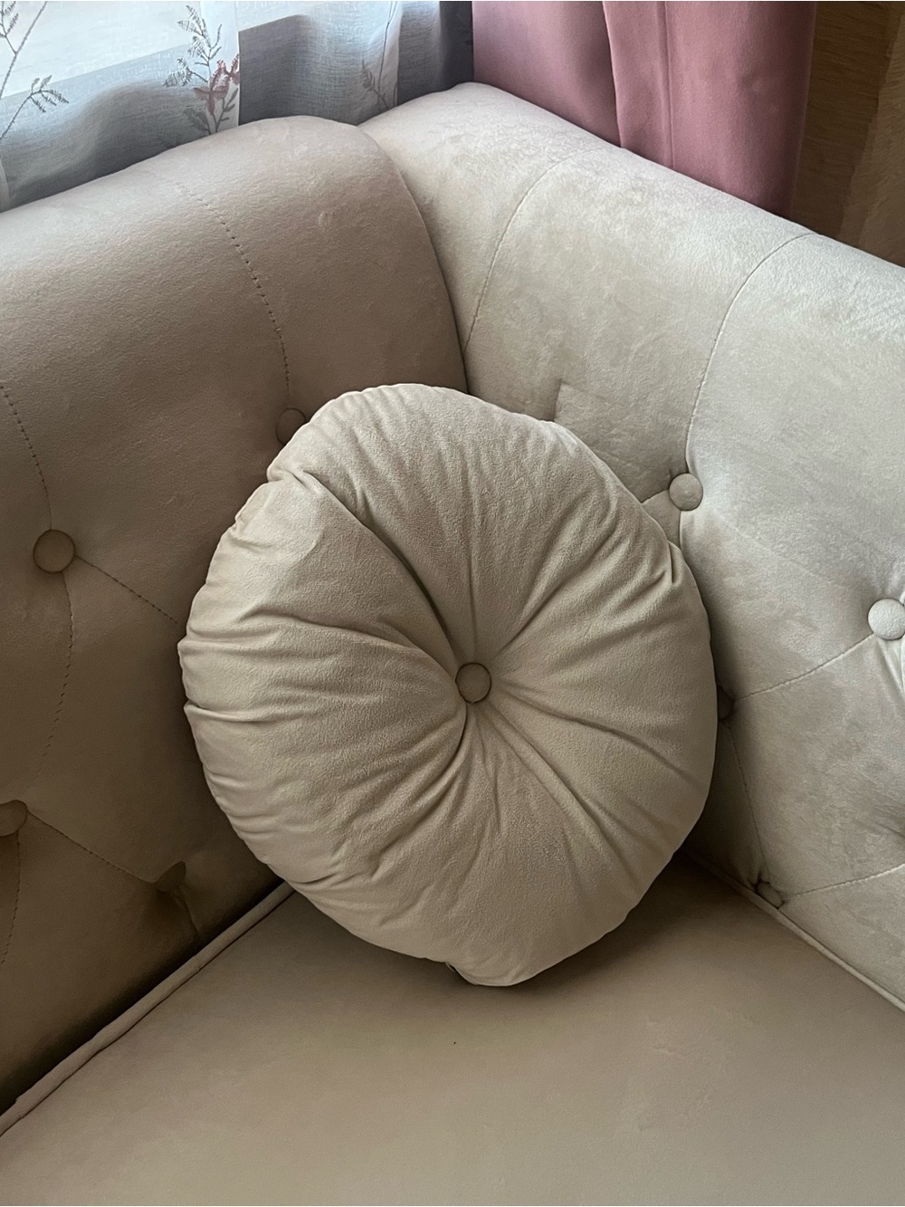 Beige pillow.